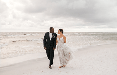 bride and groom on the beach at Hilton Sandestin Beach