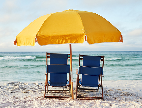 chairs and umbrellas on a Gulf Coast beach