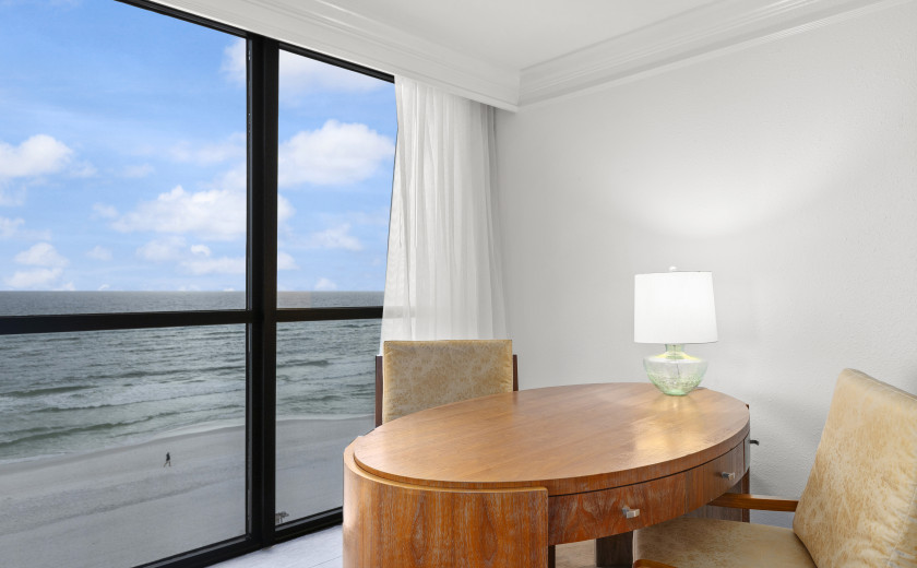 Desk in a resort suite with views of Destin, Florida's beach