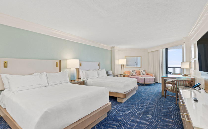Two queen beds in a Destin, Florida suite overlooking the coast