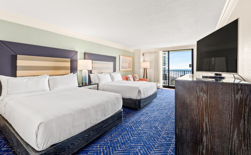Double queen beds in a beachfront hotel in Destin