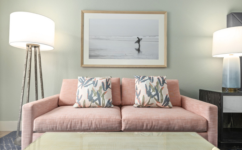 Pink couch in a living room suite at Hilton in Destin, Florida